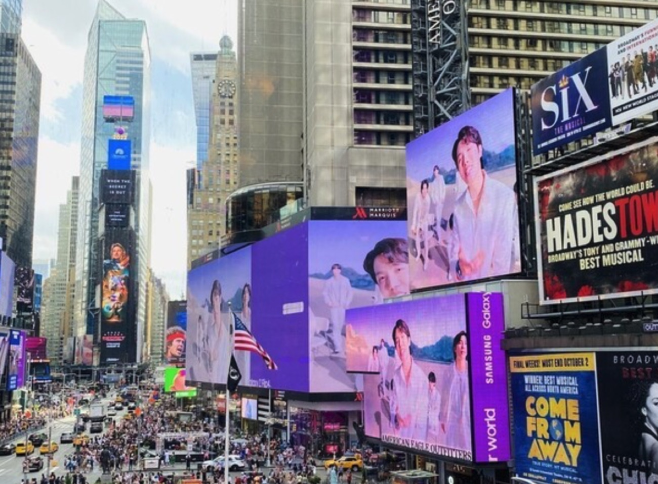 BTS billboards filling the heart of Times Square — K-culture is already part of everyday America.